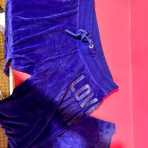 Sweatpants flaired at the bottom